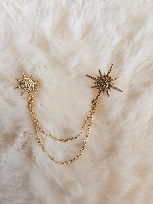 Broche étoiles + chaînes dorés